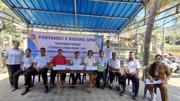 Pelaksanaan SPM Bidang Kesehatan dan Pendidikan oleh TP Posyandu